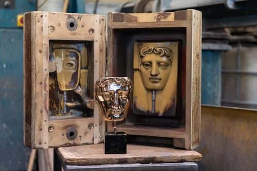 A completed mask is pictured next to the master cast during casting of the masks for the BAFTA British Academy Film Awards at New Pro Foundries in west London on January January 21, 2020 in London, England.