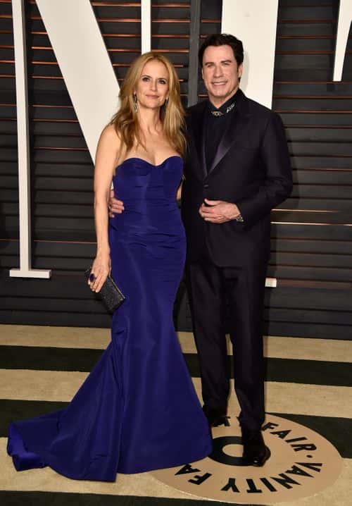 Actors Kelly Preston (L) and John Travolta attend the 2015 Vanity Fair Oscar Party hosted by Graydon Carter at Wallis Annenberg Center for the Performing Arts on February 22, 2015 in Beverly Hills, California. (Photo by Pascal Le Segretain/Getty Images)