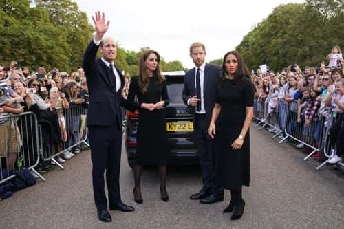 Catherine, Princess of Wales, Prince William, Prince of Wales, Prince Harry, Duke of Sussex, and Meghan, Duchess of Sussex meet members of the public on the long Walk at Windsor Castle on September 10, 2022 in Windsor, England. Crowds have gathered and tributes left at the gates of Windsor Castle to Queen Elizabeth II, who died at Balmoral Castle on 8 September, 2022.