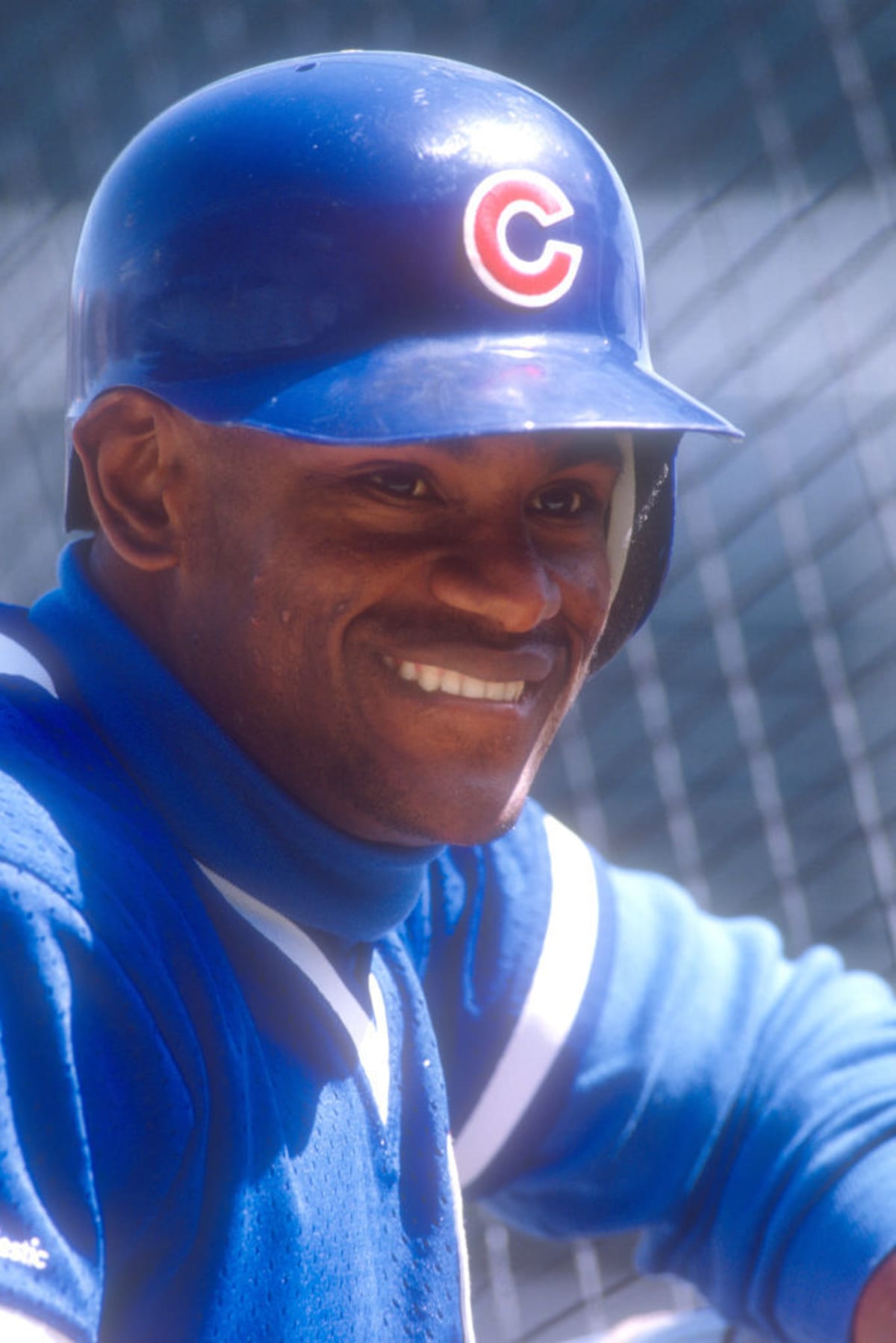 Sammy Sosa #21 of the Chicago Cubs looks on during batting practice of a baseball game against the Los Angeles Dodgers on May 19, 1992 at Wrigley Field in Chicago, Illinois. (Photo by Mitchell Layton/Getty Images)
