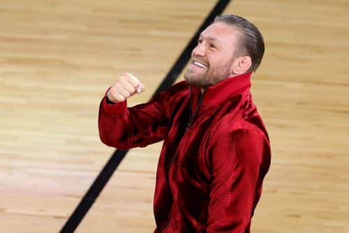 Conor McGregor is seen on the court during a timeout in Game Four of the 2023 NBA Finals between the Denver Nuggets and the Miami Heat at Kaseya Center on June 09, 2023 in Miami, Florida. NOTE TO USER: User expressly acknowledges and agrees that, by downloading and or using this photograph, User is consenting to the terms and conditions of the Getty Images License Agreement.