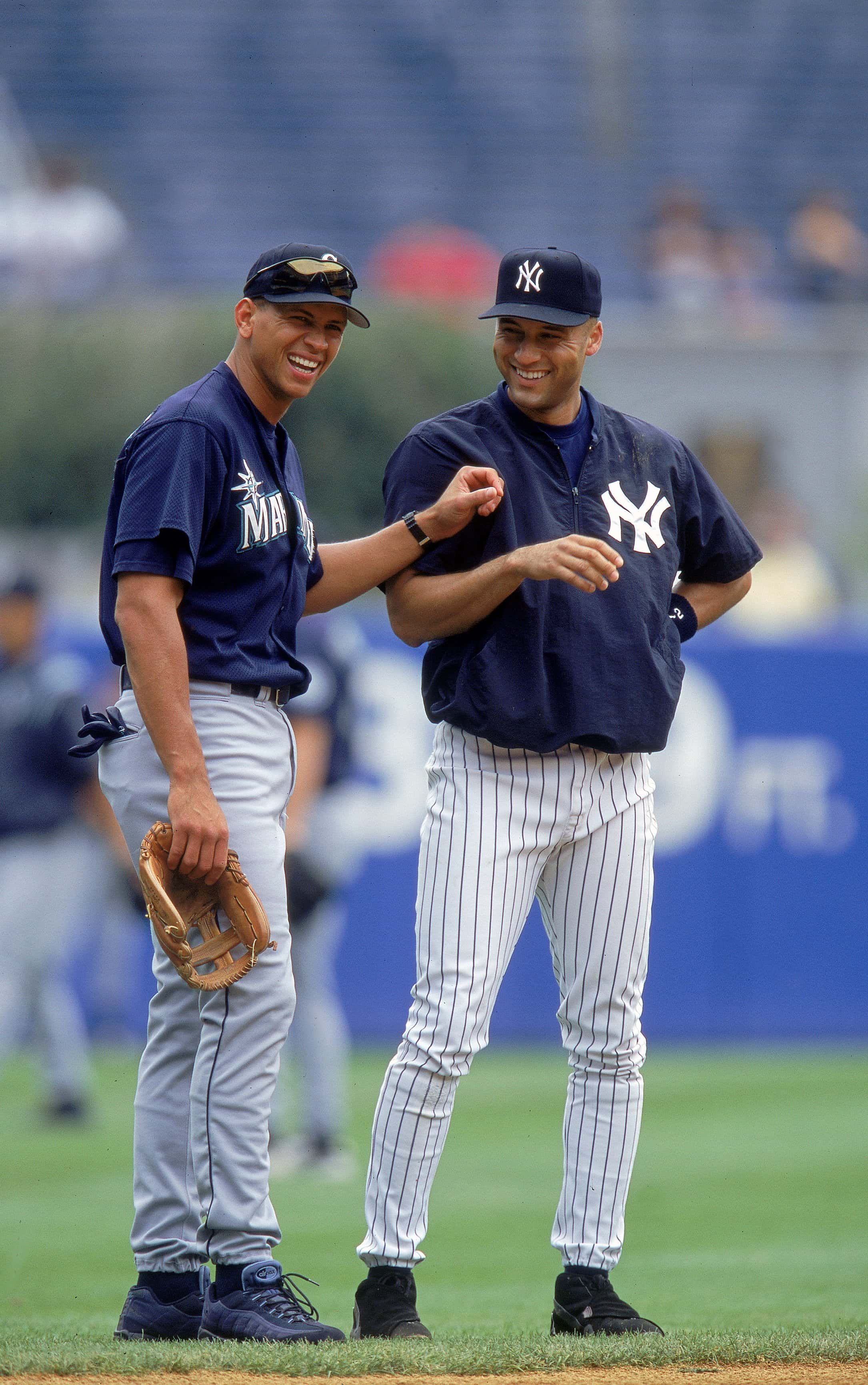 Alex Rodriguez #3 and Derek Jeter #2 of the Seattle Mariners