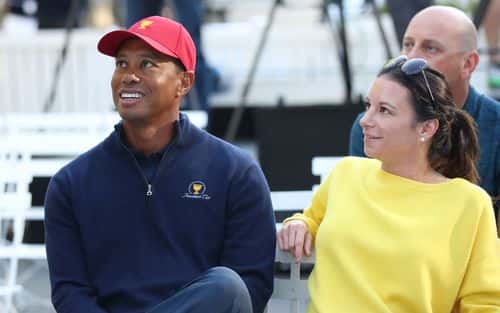 Tiger Woods and his girlfriend Erica Herman look on during a Presidents Cup media opportunity at the Yarra Promenade on December 5, 2018 in Melbourne, Australia. The Presidents Cup 2019 will be held on December 9-15, 2019, when it returns to the prestigious Royal Melbourne Golf Club in Australia.