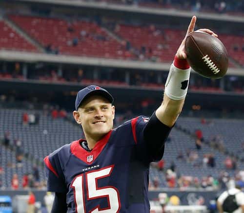 Ryan Mallett #15 of the Houston Texans points to the crowd as he walks off the field afterf defeating the Tampa Bay Buccaneers 19-9 at NRG Stadium on September 27, 2015 in Houston, Texas.