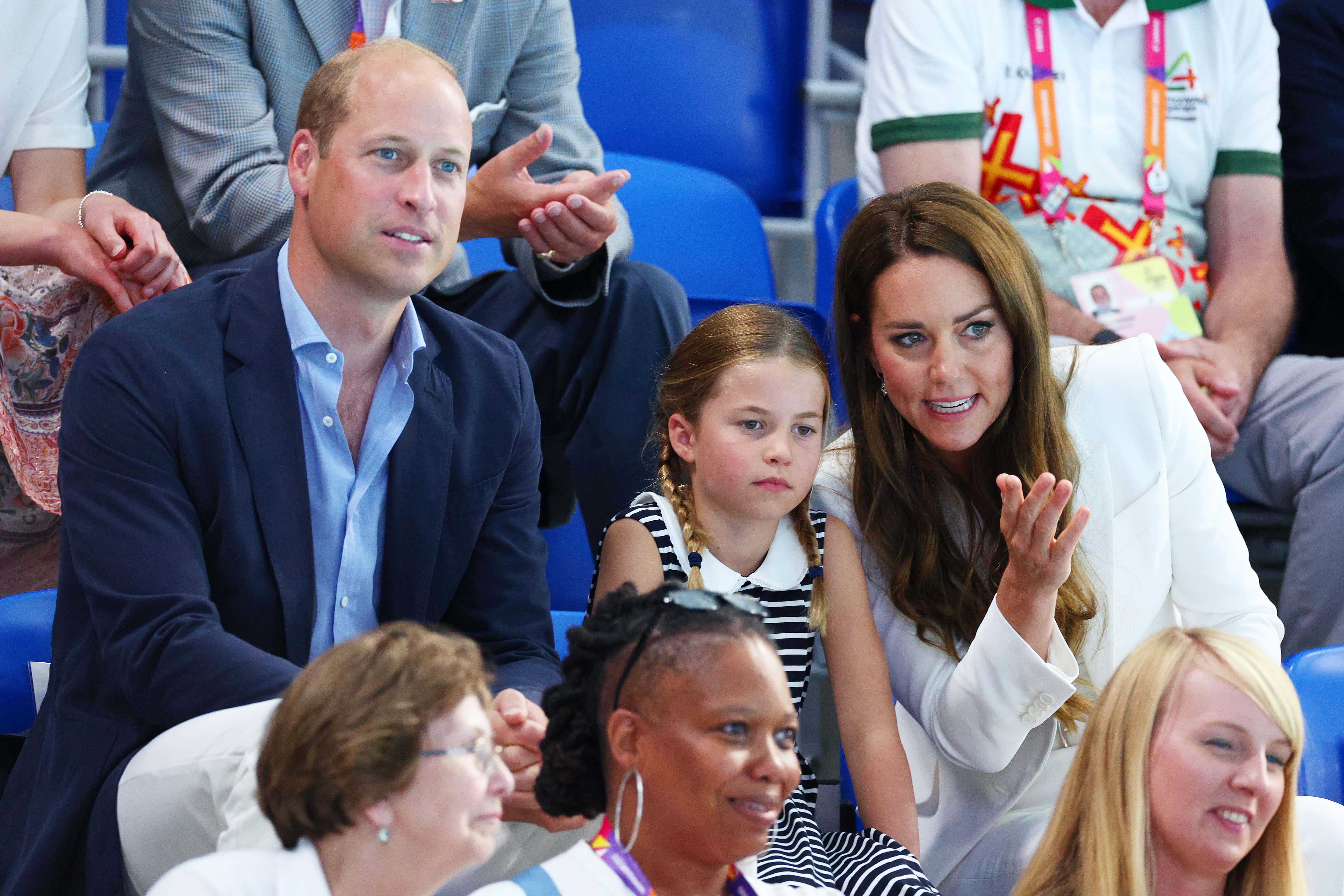 Prince William, Duke of Cambridge, Princess Charlotte and Catherine, Duchess of Cambridge watch the action on day five of the Birmingham 2022 Commonwealth Games at Sandwell Aquatics Centre on August 02, 2022 in Smethwick, England.
