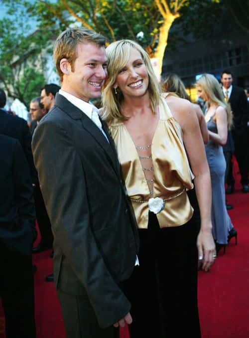 Actress Toni Collete and her husband Dave Galafassi pose for photographs during the red carpet arrivals at the 45th Australian Film Industries Awards 2003 at Her Majesty's Theatre on November 21, 2003 in Melbourne, Australia.