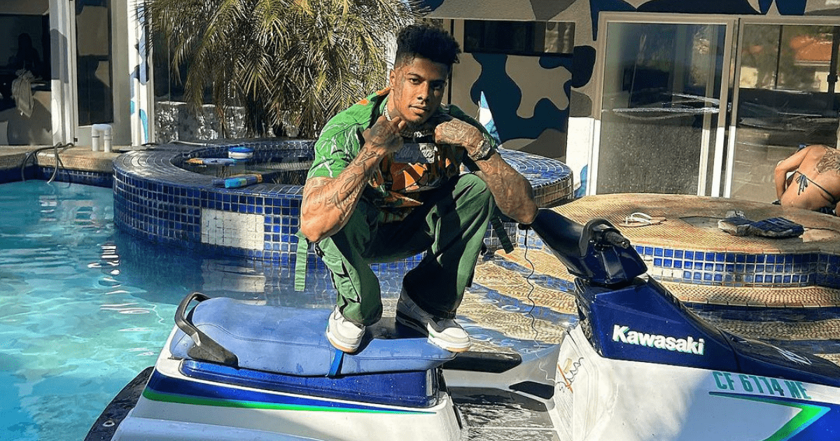 Blueface, the rapper, was stabbed in the leg while wearing a black tank top and beige shorts (Instagram/bluefasebabyy)