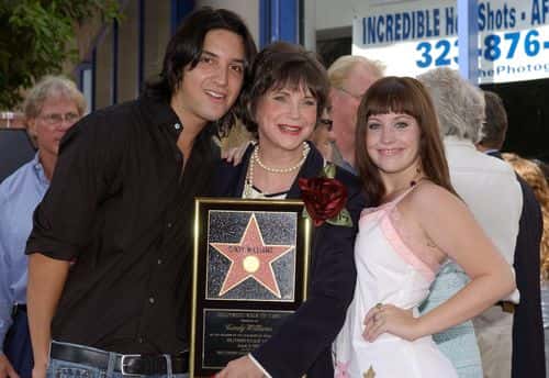 Actress Cindy Williams (C) poses with her son Zachary Hudson and duaghter Emily Hudson at the ceremony honoring her and actress Penny Marshall each with a star on the Hollywood Walk of Fame on August 12, 2004 in Hollywood, California.