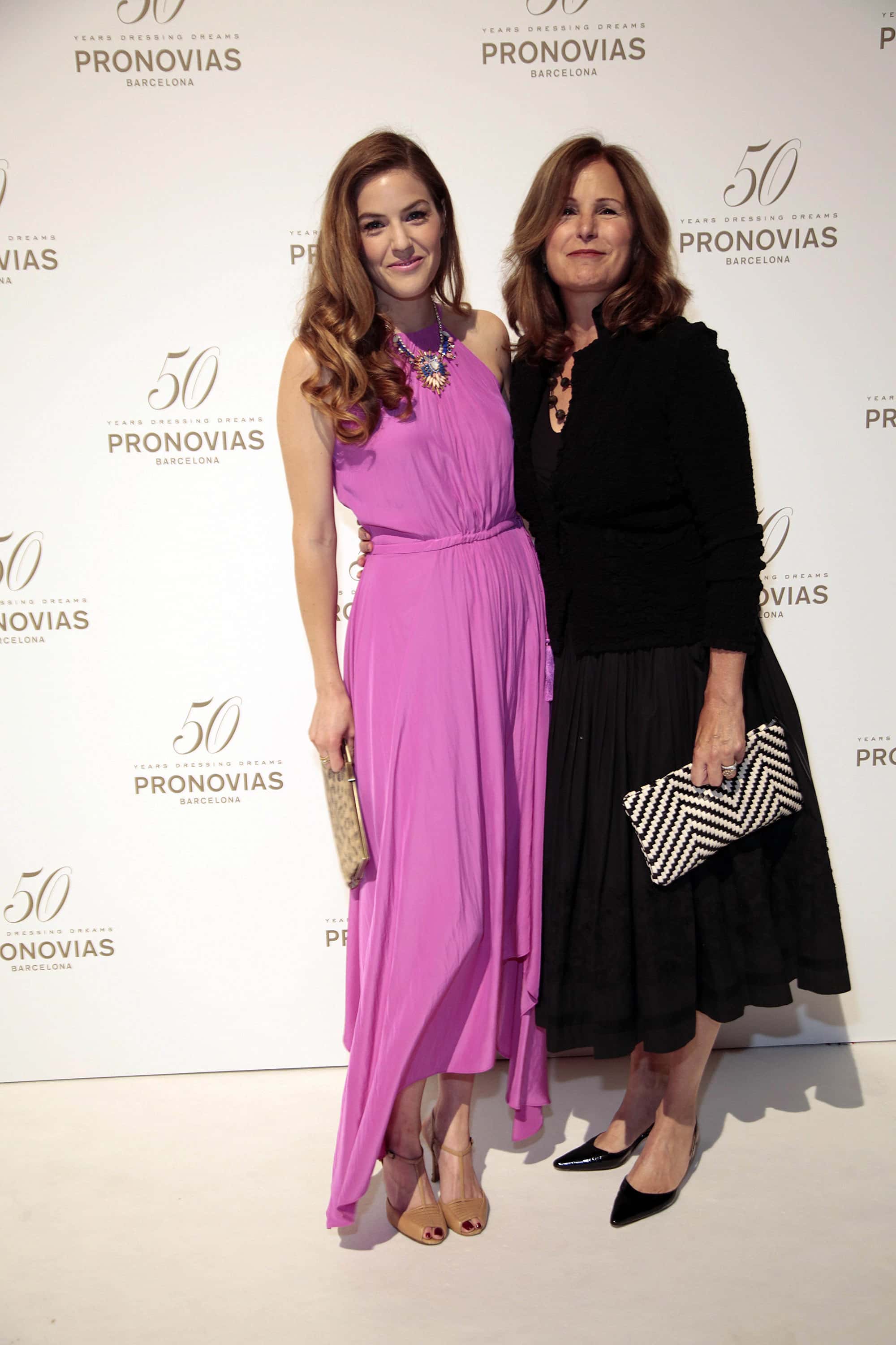  (L-R) Lily Costner and Cindy Silva pose during a photocall for the Pronovia's 50th anniversary bridal fashion show during 'Barcelona Bridal Week 2014'on May 9, 2014, in Barcelona, Spain. (Photo by Miquel Benitez/Getty Images)