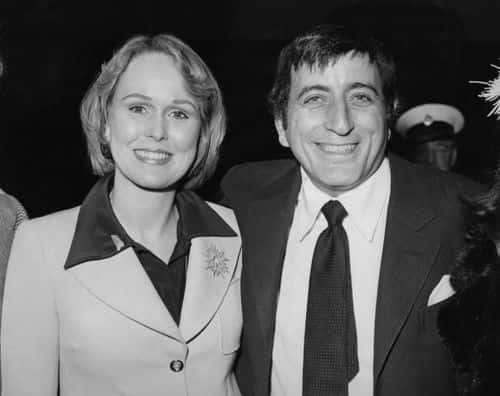 American singer Tony Bennett and his wife, actress Sandra Grant Bennett arrive at the ABC Cinema on Shaftesbury Avenue, London, for the midnight premiere of 'Lady Sings the Blues', 4th April 1973. (Photo by Central Press/Hulton Archive/Getty Images)