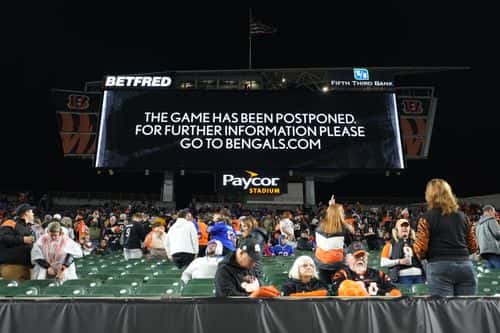 An announcement is displayed on the scoreboard as the game between the Cincinnati Bengals and the Buffalo Bills is postponed following the injury of Damar Hamlin #3 of the Buffalo Bills during the first quarter at Paycor Stadium on January 02, 2023 in Cincinnati, Ohio.