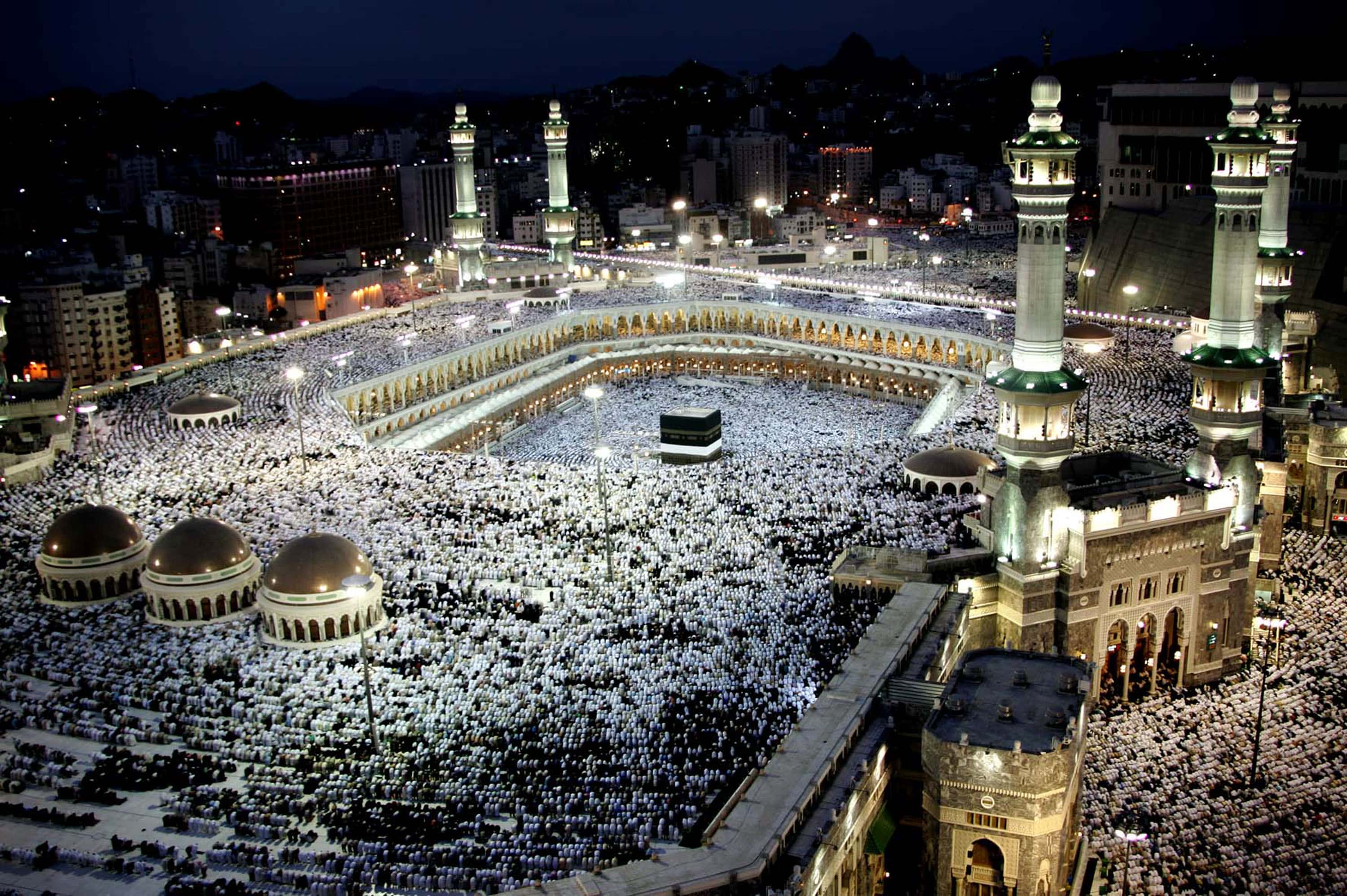 Muslim pilgrims pray at the holy Kaaba at Mecca's Grand Mosque during the annual hajj rituals January 17, 2005 in Mecca, Saudi Arabia. Officials say over 1.6 million worshippers have come from abroad for this year's haj, a once-in-a-lifetime duty for every able-bodied Muslim.