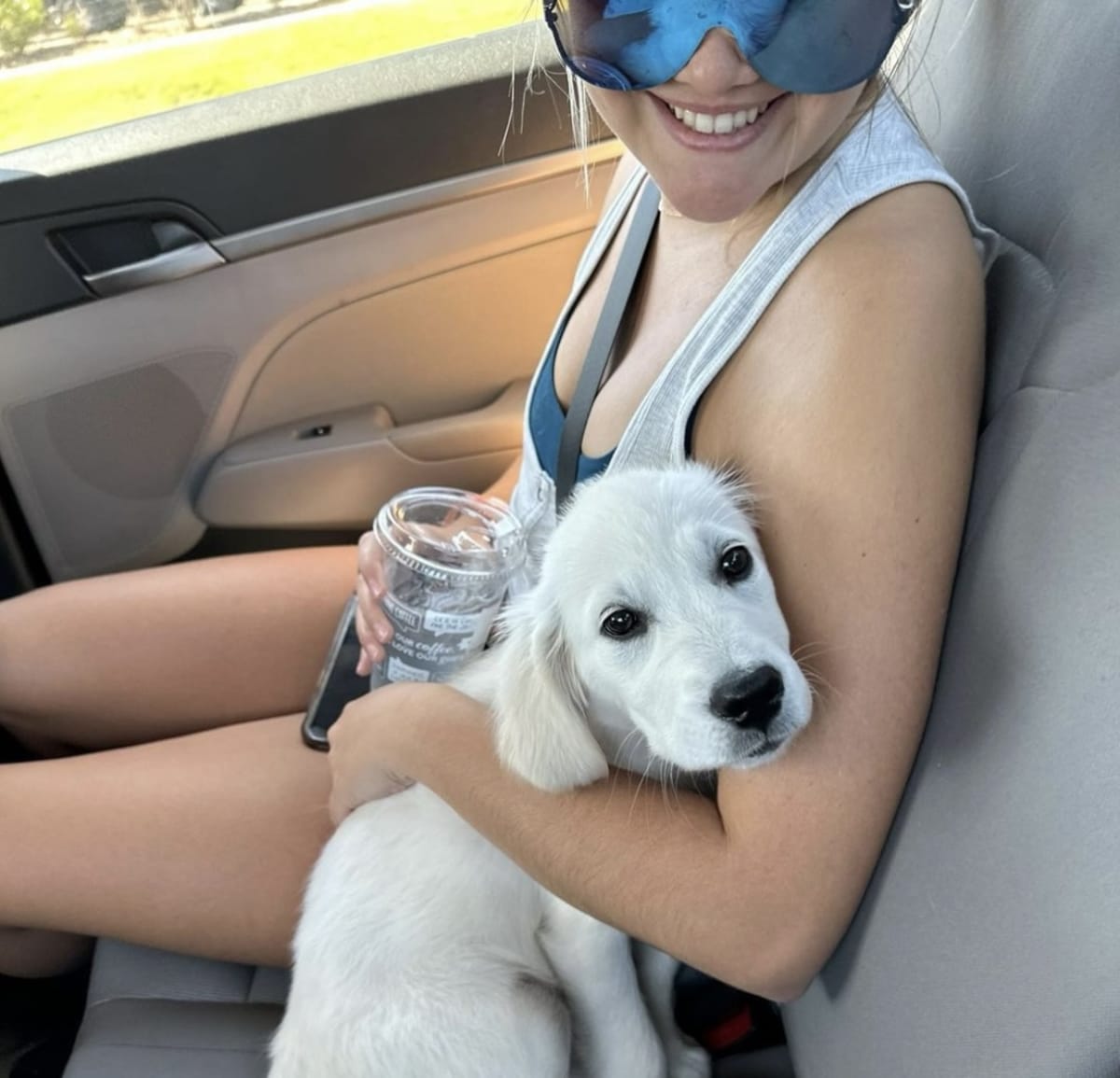 Julz Dunne with Olivia Dunne's puppy (