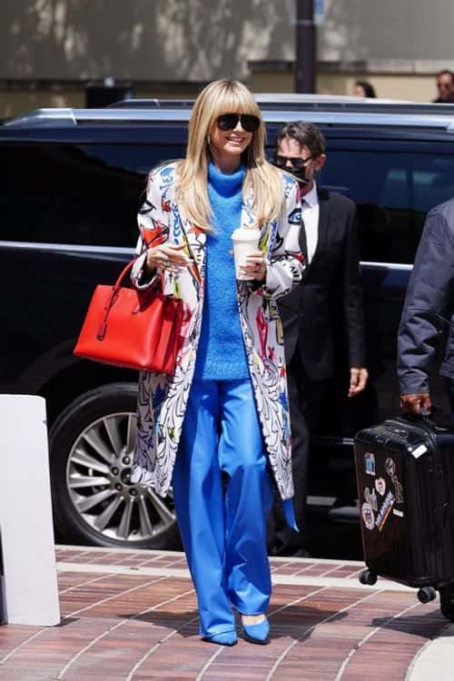 Klum wore a vibrantly patterned and multicolored overcoat with matching pair of shoes (Backgrid)