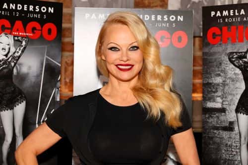 Pamela Anderson poses during a photo call for her Broadway debut in