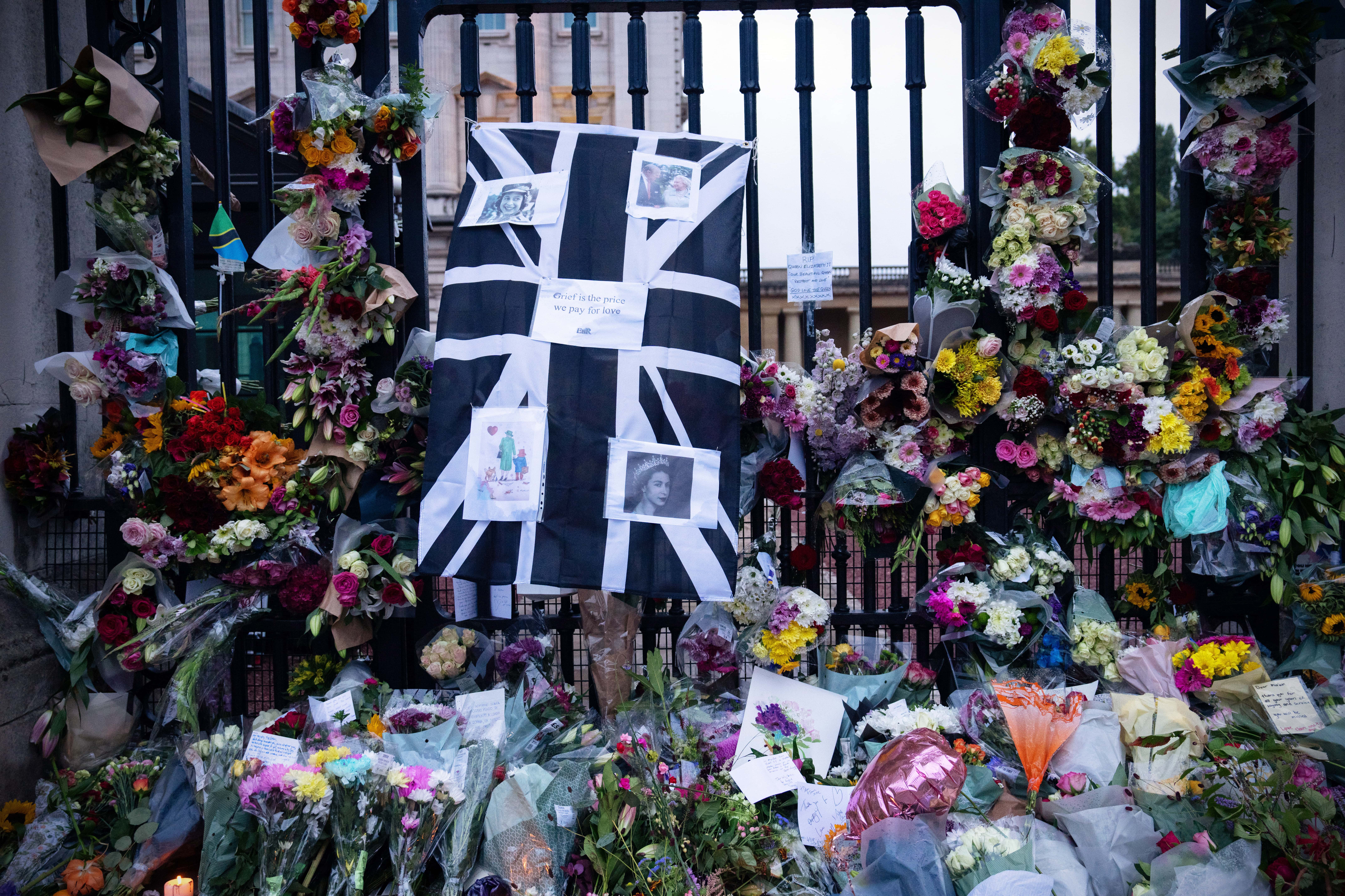 Flowers and tributes to Queen Elizabeth II are placed outside Buckingham Palace on September 9, 2022 in London, United Kingdom. Elizabeth Alexandra Mary Windsor was born in Bruton Street, Mayfair, London on 21 April 1926. She married Prince Philip in 1947 and acceded the throne of the United Kingdom and Commonwealth on 6 February 1952 after the death of her Father, King George VI. Queen Elizabeth II died at Balmoral Castle in Scotland on September 8, 2022, and is succeeded by her eldest son, King Charles III. (Photo by Carl Court/Getty Images)