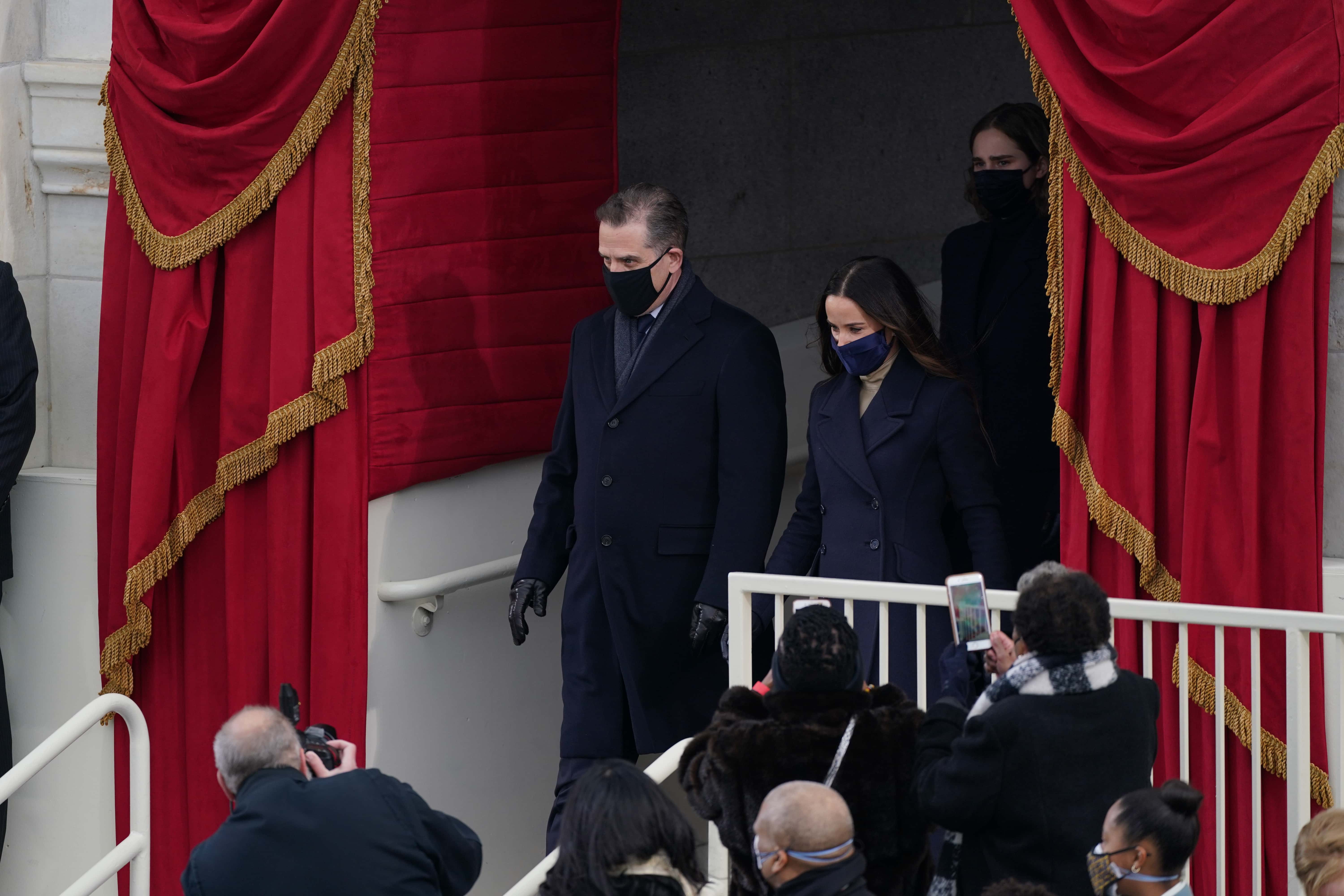Hunter Biden and his wife Kathleen arrive at the inauguration of U.S. President-elect Joe Biden on the West Front of the U.S. Capitol on January 20, 2021 in Washington, DC.  During today's inauguration ceremony Joe Biden becomes the 46th president of the United States.