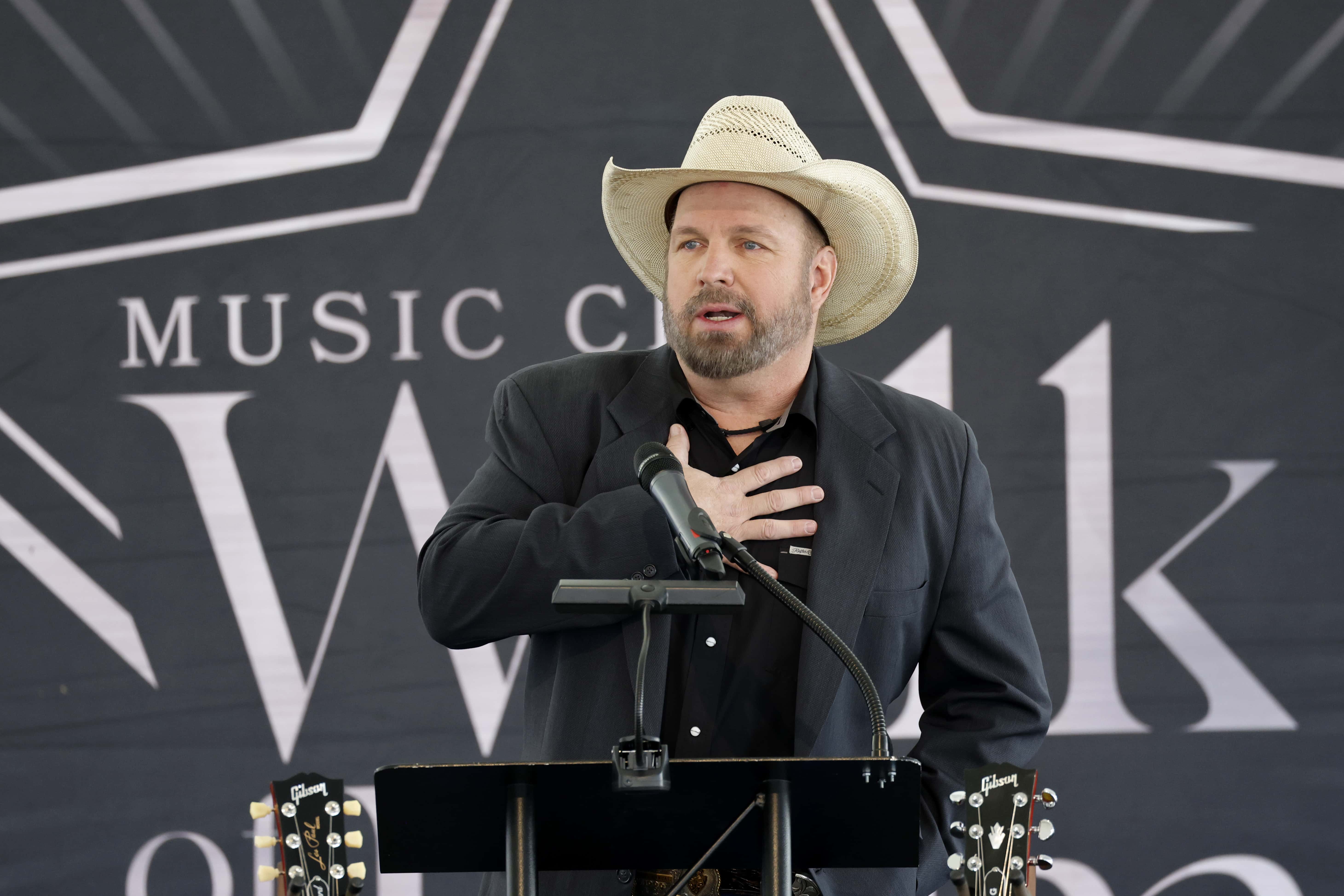 Garth Brooks speaks at the 2023 Music City Walk of Fame Induction ceremony at Music City Walk of Fame on May 04, 2023, in Nashville, Tennessee. (Photo by Jason Kempin/Getty Images)