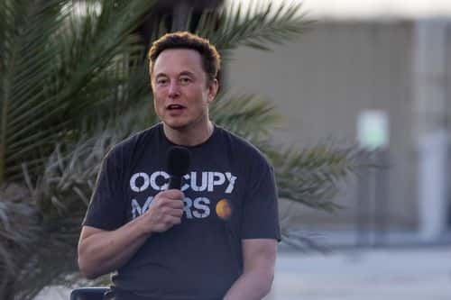 SpaceX founder Elon Musk speaks during a T-Mobile and SpaceX joint event on August 25, 2022 in Boca Chica Beach, Texas. The two companies announced plans to work together to provide T-Mobile cellular service using Starlink satellites.