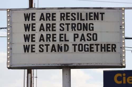 A sign is posted near the scene of a mass shooting at a Walmart which left at least 20 people dead on August 4, 2019 in El Paso, Texas. A 21-year-old male suspect, identified as Patrick Crusius from a Dallas suburb, surrendered to police at the scene. At least 26 people were wounded in the shooting.