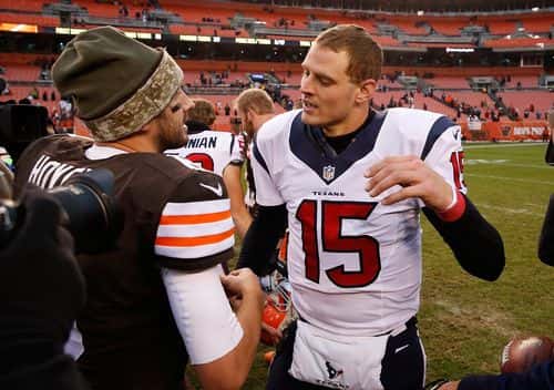 Ryan Mallett #15 of the Houston Texans is congratulated by Brian Hoyer #6 of the Cleveland Browns after Houston's 23-7 win at FirstEnergy Stadium on November 16, 2014 in Cleveland, Ohio.