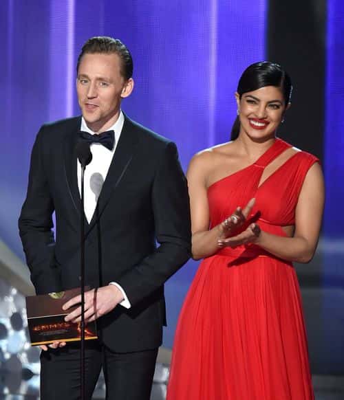 Actors Tom Hiddleston and Priyanka Chopra speak onstage during the 68th Annual Primetime Emmy Awards at Microsoft Theater on September 18, 2016 in Los Angeles, California.