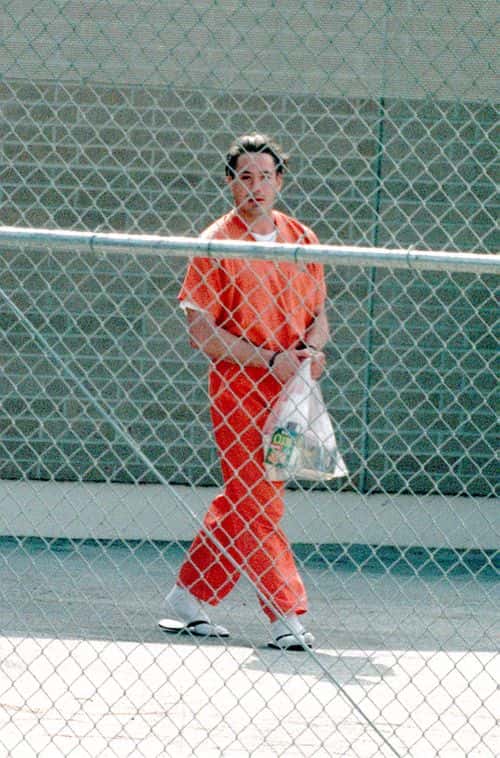 (FILE PHOTO) Actor Robert Downey, Jr. on his way to a prison bus after his hearing August 5, 1999 in Malibu, California. Downey was arrested again November 25, 2000 for drug possession in Palm Springs, CA three months after being released from prison and relaunching his career. He was released today on $15, 000 bail.