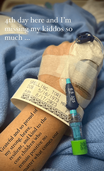 Tori confirmed that she had been hospitalized hours earlier, sharing a photo of her hand hooked up to an IV on her Instagram Stories (torispelling/Instagram)
