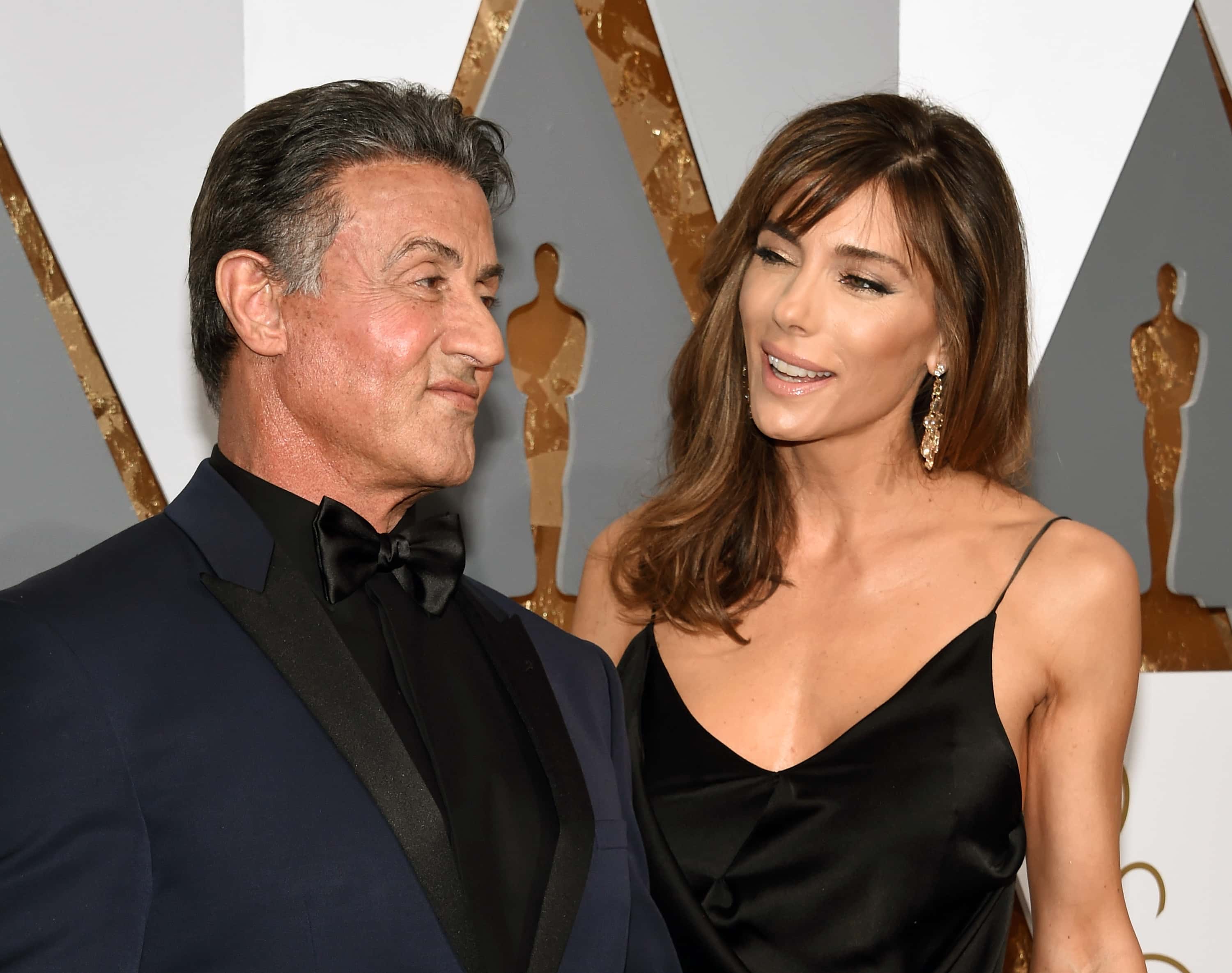 Actor Sylvester Stallone (L) and model Jennifer Flavin attend the 88th Annual Academy Awards at Hollywood & Highland Center on February 28, 2016 in Hollywood, California.