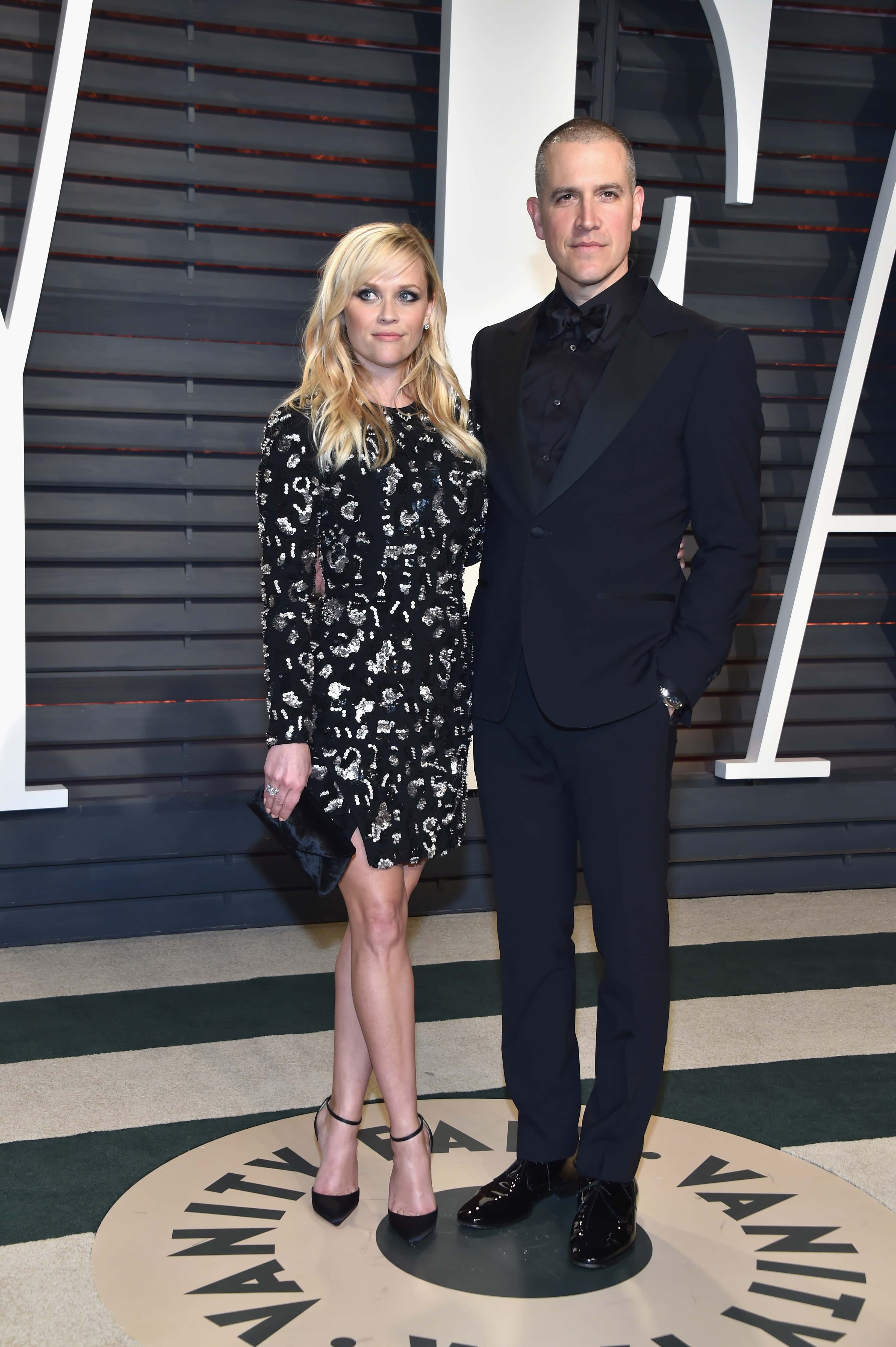 Actor Reese Witherspoon and Jim Toth attend the 2017 Vanity Fair Oscar Party hosted by Graydon Carter at Wallis Annenberg Center for the Performing Arts on February 26, 2017, in Beverly Hills, California. (Photo by Pascal Le Segretain/Getty Images)