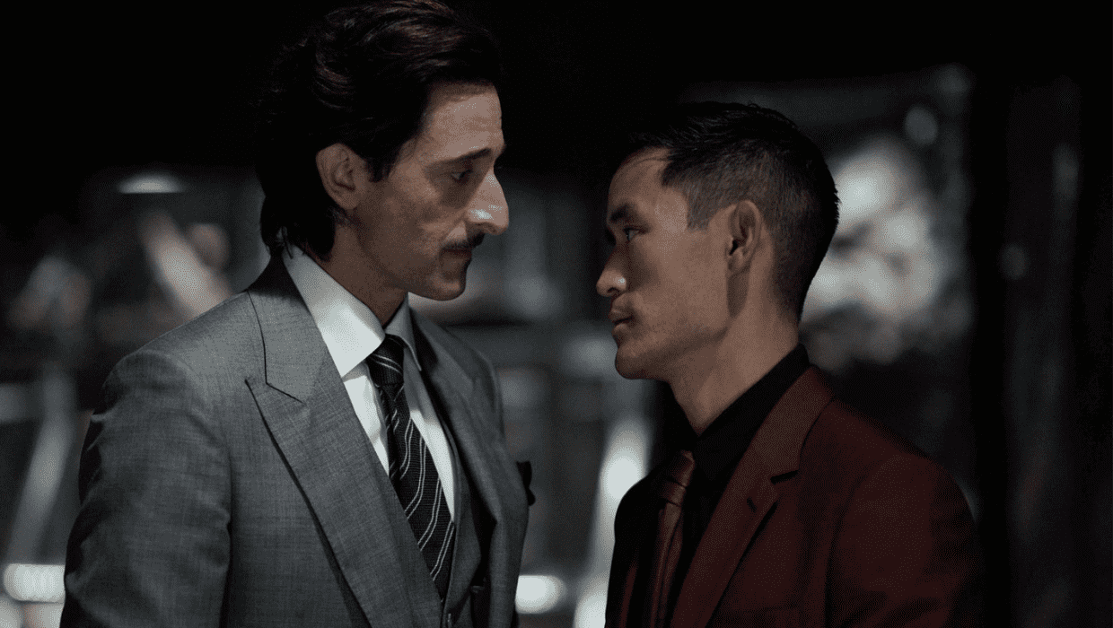 Adrien Brody and Mike Moh in 'Ghosted' (Apple TV+)