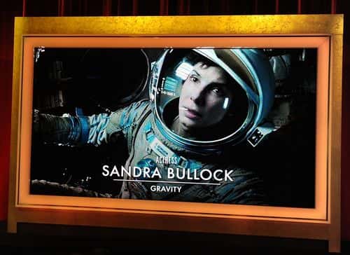 An image is displayed on a big screen onstage of Best Actress nominee Sandra Bullock for her acting role in the film 'Gravity' at the 86th Academy Awards Nominations Announcement at the AMPAS Samuel Goldwyn Theater on January 16, 2014 in Beverly Hills, California.
