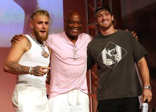 Anderson Silva poses for a photo between Jake Paul and brother Logan Paul during a Jake Paul v Anderson Silva press conference at NeueHouse Hollywood on September 12, 2022 in Hollywood, California.