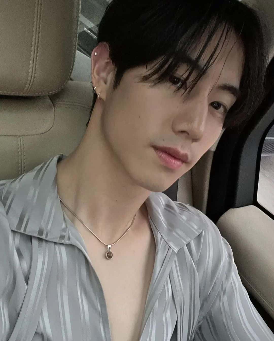 GOT7's Mark Tuan on his way to the Saint Laurent fashion show (@voguehongkong/Instagram)