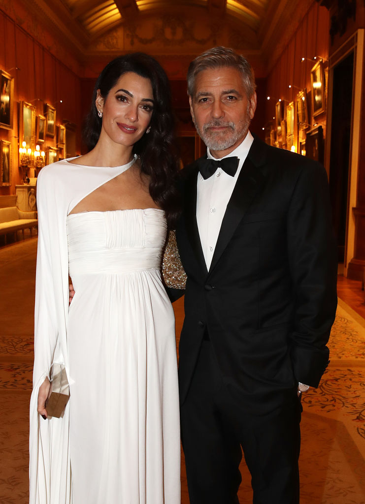 Amal Clooney and George Clooney attend a dinner to celebrate The Prince's Trust, hosted by Prince Charles, Prince of Wales at Buckingham Palace on March 12, 2019, in London, England. (Photo by Chris Jackson - WPA Pool/Getty Images)