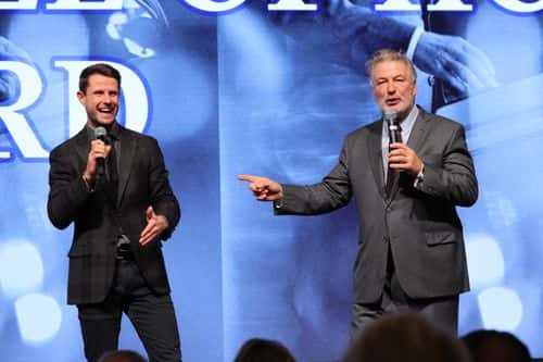 Auctioneer Harry Santa-Olalla and Alec Baldwin speak onstage at the 2022 Robert F. Kennedy Human Rights Ripple of Hope Gala at New York Hilton on December 06, 2022 in New York City. (Photo by Mike Coppola/Getty Images for 2022 Robert F. Kennedy Human Rights Ripple of Hope Gala)