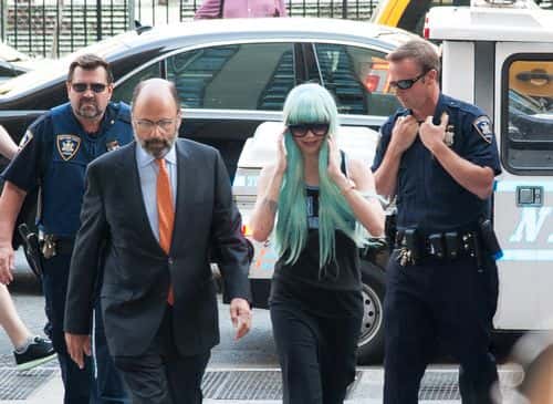 Amanda Bynes arrives for  an appearance at Manhattan Criminal Court on July 9, 2013 in New York City. Bynes is facing charges of reckless endangerment, tampering with evidence and criminal possession of marijuana in relation to her arrest on May 23, 2013.