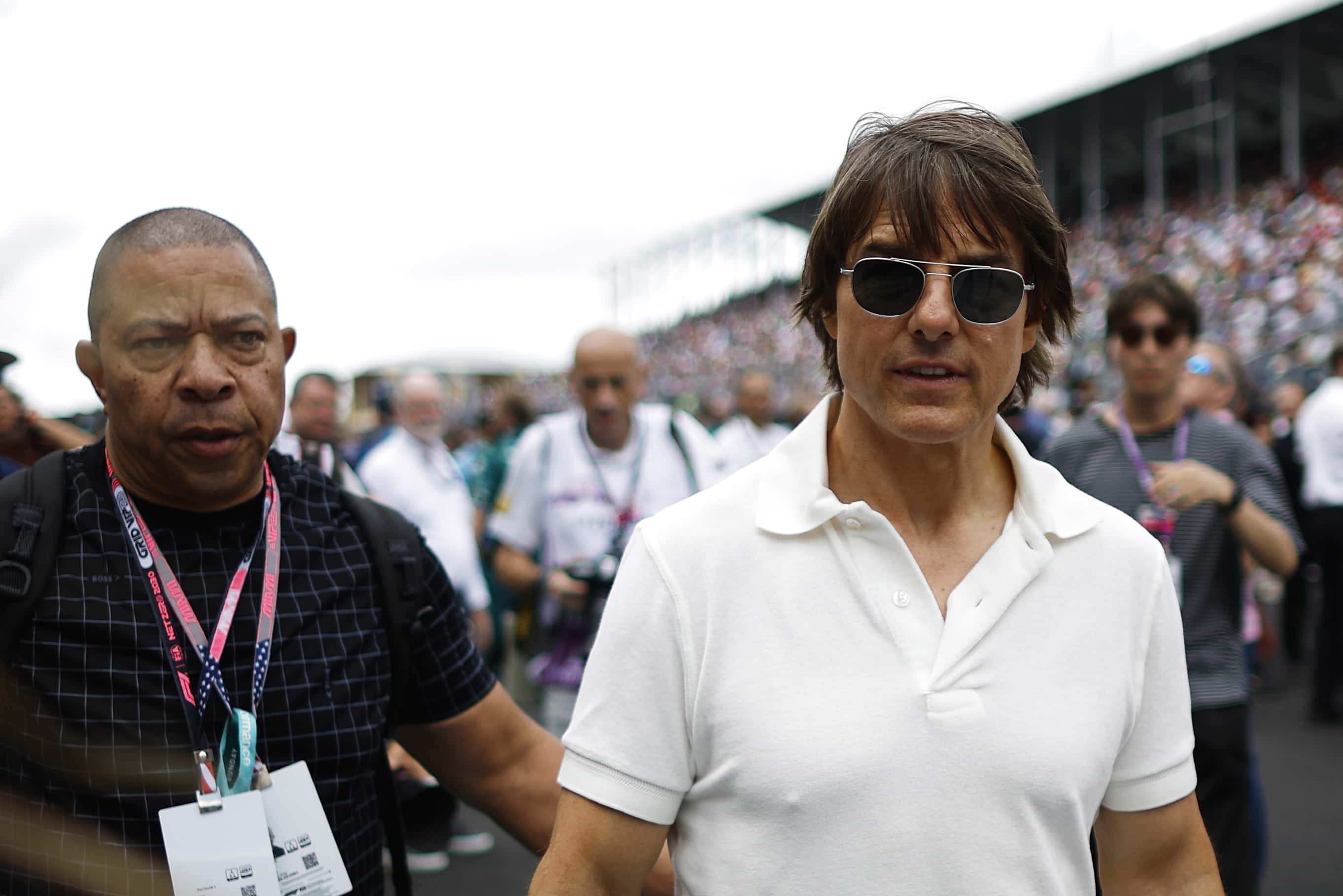 Tom Cruise walks on the grid during the F1 Grand Prix of Miami at Miami International Autodrome on May 07, 2023, in Miami, Florida. (Photo by Chris Graythen/Getty Images)
