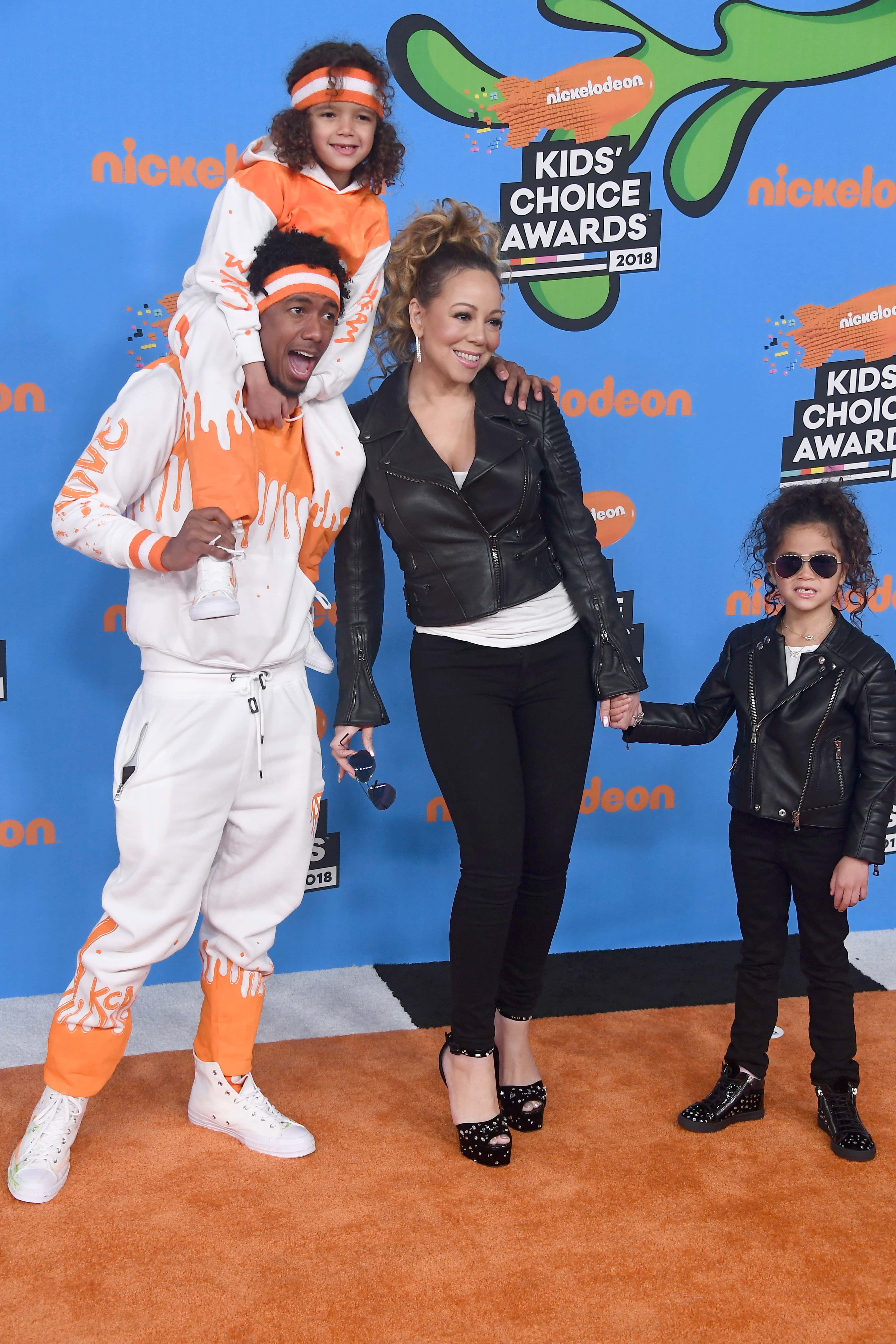(L-R) Moroccan Scott Cannon (top), Nick Cannon, Mariah Carey, and Monroe Cannon attend Nickelodeon's 2018 Kids' Choice Awards at The Forum on March 24, 2018 in Inglewood, California.