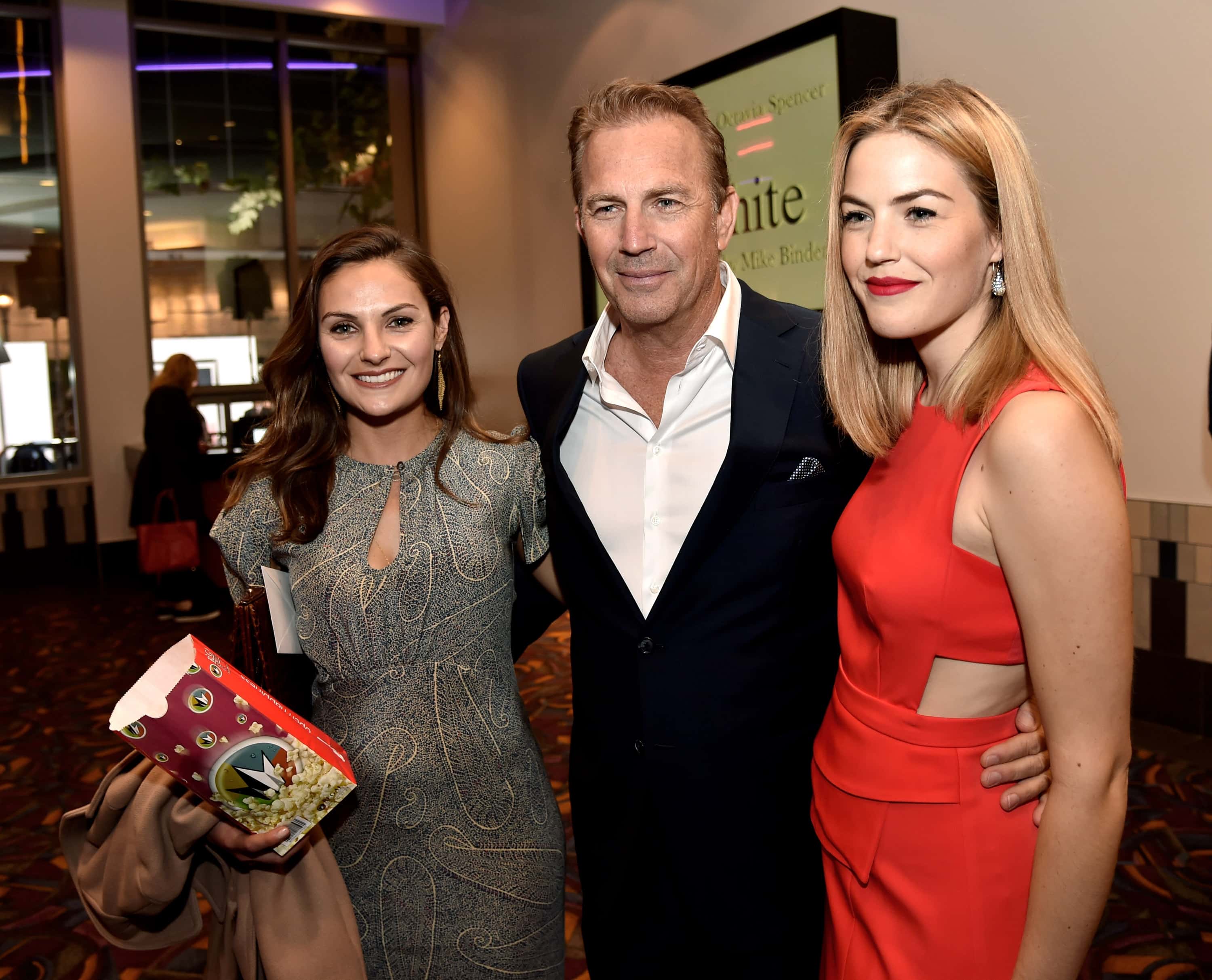 (L-R) Actress Annie Costner, actor Kevin Costner and actress Lily Costner arrive at the premiere of Relativity Media's 