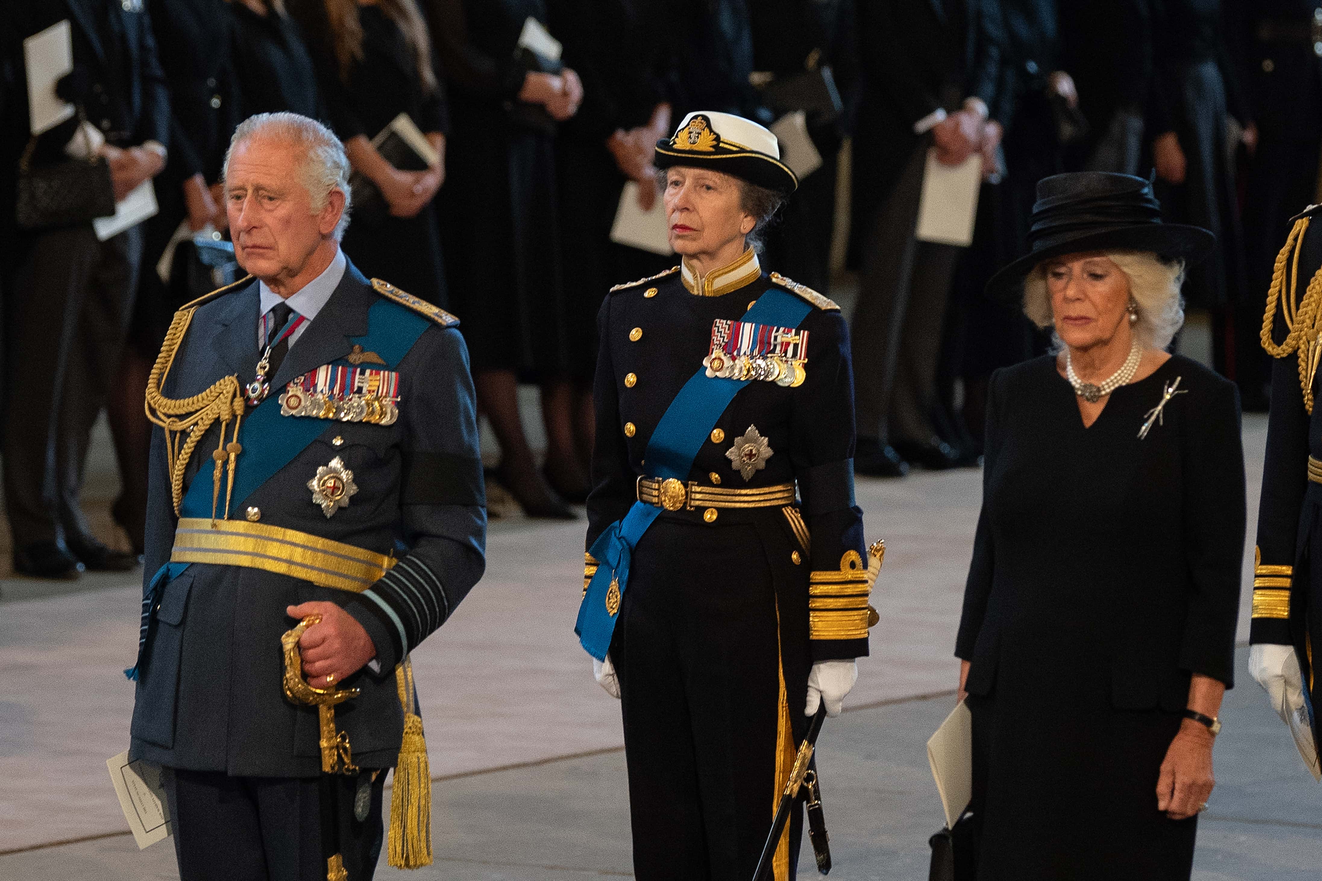 King Charles III, Princess Anne, Princess Royal and Camilla, Queen Consort pay their respects in The Palace of Westminster during the procession for the Lying-in State of Queen Elizabeth II on September 14, 2022 in London, England. Queen Elizabeth II's coffin is taken in procession on a Gun Carriage of The King's Troop Royal Horse Artillery from Buckingham Palace to Westminster Hall where she will lay in state until the early morning of her funeral. Queen Elizabeth II died at Balmoral Castle in Scotland on September 8, 2022, and is succeeded by her eldest son, King Charles III.