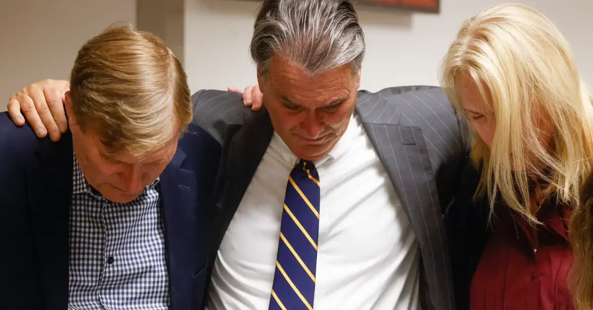 John and Pamela Crews, parents of deceased Jonathan Crews and their attorney Thomas Shaw, center, take part in a prayer after Brenda Kelly, former girlfriend of Jonathan was found liable in a jury verdict at George Allen Civil Courts Building in Dallas on Friday, Sept. 23, 2022. In 2014, (Shafkat Anowar / Staff Photographer)