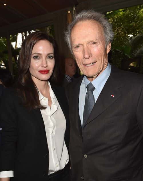 Actress/director Angelina Jolie (L) and actor/director Clint Eastwood attend the 15th Annual AFI Awards at Four Seasons Hotel Los Angeles at Beverly Hills on January 9, 2015 in Beverly Hills, California.