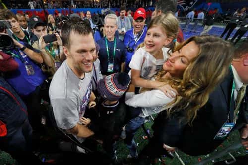 Tom Brady #12 of the New England Patriots celebrates with wife Gisele Bundchen and children Vivian and Benjamin after Super Bowl LIII at Mercedes-Benz Stadium on February 3, 2019 in Atlanta, Georgia. The New England Patriots defeat the Los Angeles Rams 13-3.