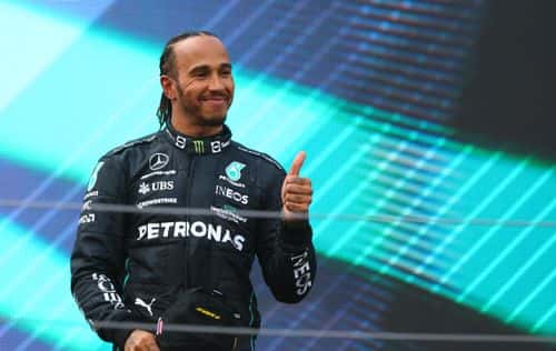 Third placed Lewis Hamilton of Great Britain and Mercedes celebrates on the podium during the F1 Grand Prix of Austria at Red Bull Ring on July 10, 2022 in Spielberg, Austria.