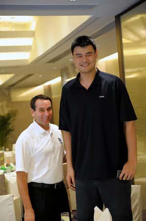 Coach Jeff Van Gundy (L) appears very little next to Yao Ming (Yao Ming/Facebook)