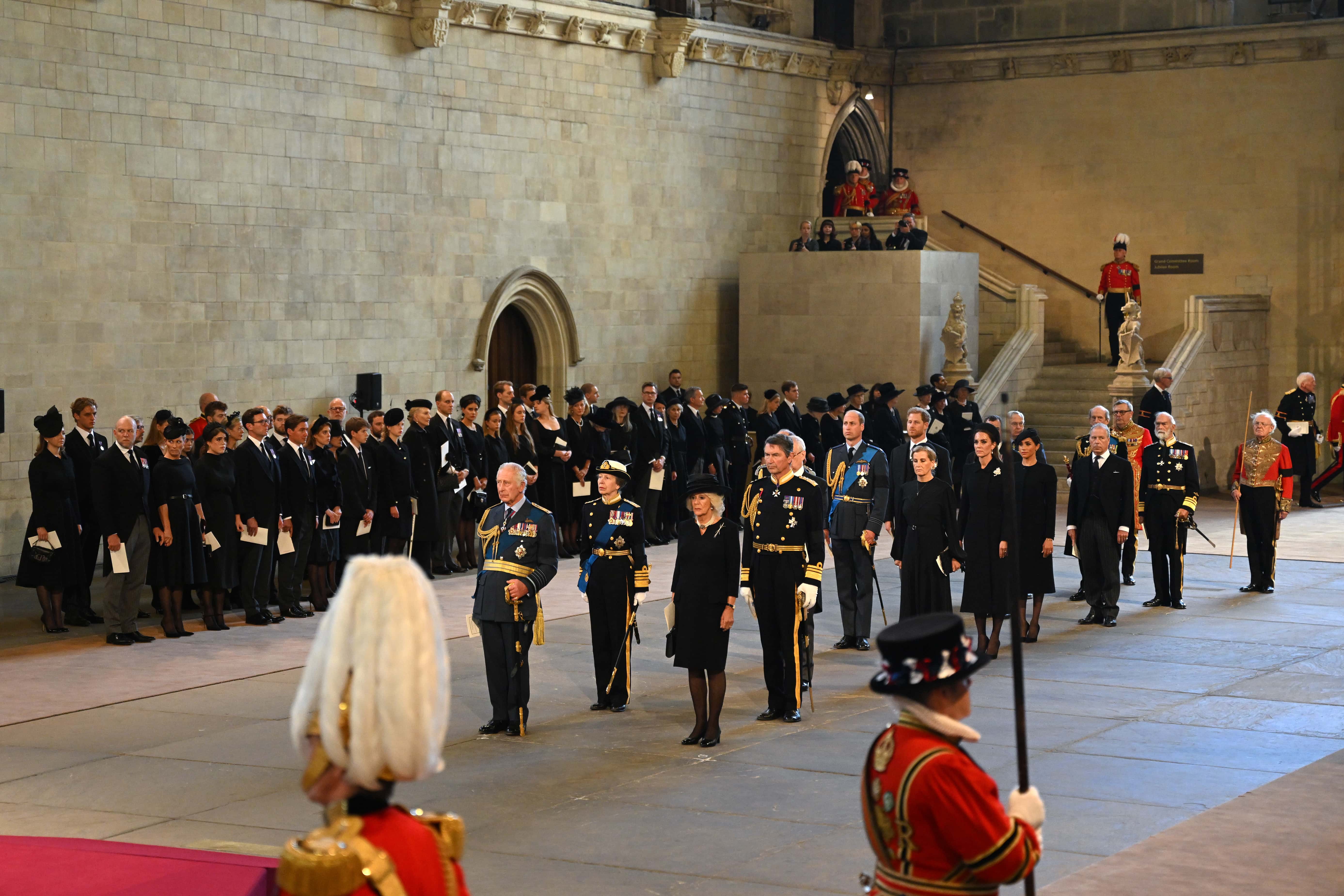 King Charles III, Anne, Princess Royal, Camilla, Queen Consort, Vice Admiral Sir Timothy Laurence, Prince William, Prince of Wales, Prince Harry, Duke of Sussex, Sophie, Countess of Wessex, Catherine, Princess of Wales, Meghan, Duchess of Sussex, Prince Edward, Duke of Kent and Prince Michael of Kent pay their respects inside the Palace of Westminster for the Lying-in State of Queen Elizabeth II on September 14, 2022 in London, England. Queen Elizabeth II's coffin is taken in procession on a Gun Carriage of The King's Troop Royal Horse Artillery from Buckingham Palace to Westminster Hall where she will lay in state until the early morning of her funeral. Queen Elizabeth II died at Balmoral Castle in Scotland on September 8, 2022, and is succeeded by her eldest son, King Charles III.