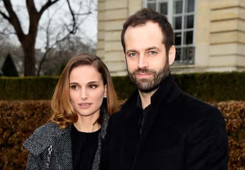 Actress Natalie Portman (L) and her husband Benjamin Millepied attend the Christian Dior show as part of Paris Fashion Week Haute Couture Spring/Summer 2015 on January 26, 2015 in Paris, France.