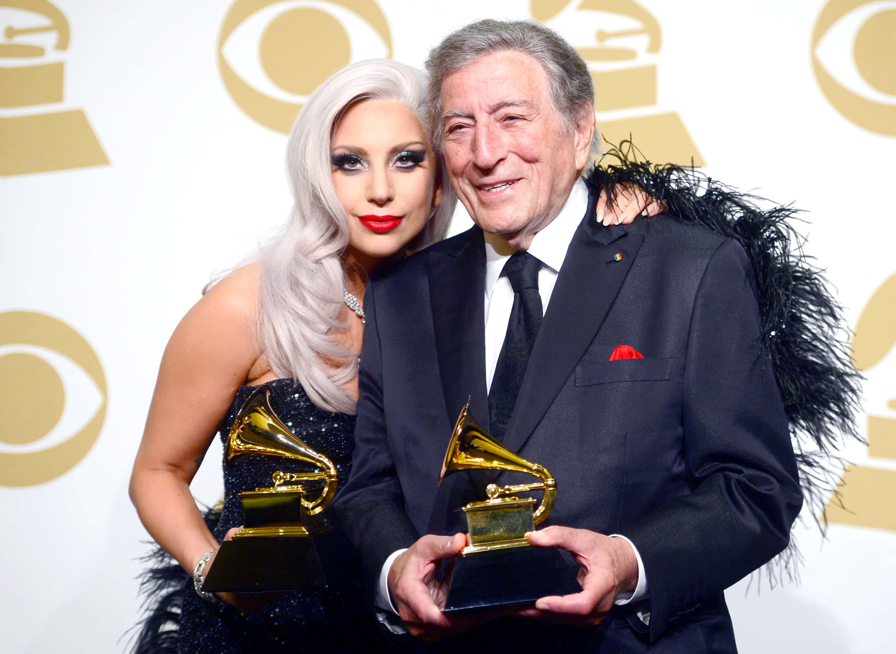 Singers Lady Gaga (L) and Tony Bennett, winners of Best Traditional Pop Vocal Album for 'Cheek to Cheek,' pose in the press room during The 57th Annual GRAMMY Awards at the STAPLES Center (Frazer Harrison/Getty Images)