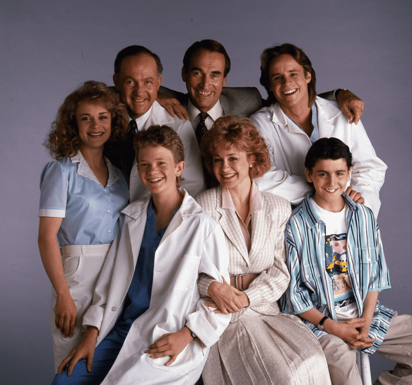 Neil Patrick Harris, Mitchell Anderson, Max Casella, Kathryn Layng, Belinda Montgomery, Lawrence Pressman, and James Sikking in Doogie Howser, M.D. (1989) (ABC Photo Archives/ABC Photo Archives/Getty Images/ via IMDB)